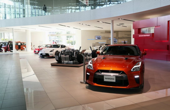 a car showroom filled with lots of cars